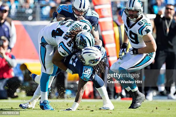 Shaq Thompson of the Carolina Panthers tackles Dexter McCluster of the Tennessee Titans at Nissan Stadium on November 15, 2015 in Nashville,...