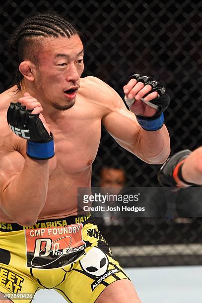Tatsuya Kawajiri squares off with Dennis Siver in their featherweight bout during the UFC Fight Night event at the O2 World on June 20, 2015 in...