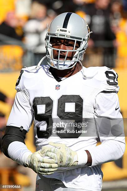 Aldon Smith of the Oakland Raiders looks on during the game against the Pittsburgh Steelers at Heinz Field on November 8, 2015 in Pittsburgh,...