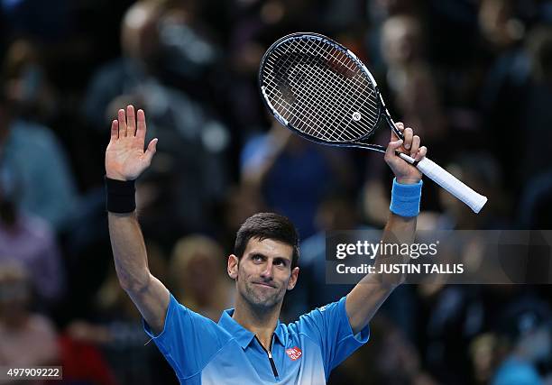 Serbia's Novak Djokovic celebrates after beating Czech Republic's Tomas Berdych , during their men's singles group stage match on day five of the ATP...