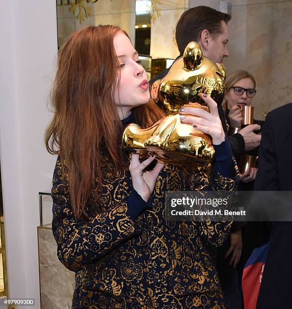 Ellie Bamber attends the Mount Street Christmas Lights switch on hosted by Linda Farrow featuring the launch of Julian The Bear, the Linda Farrow...