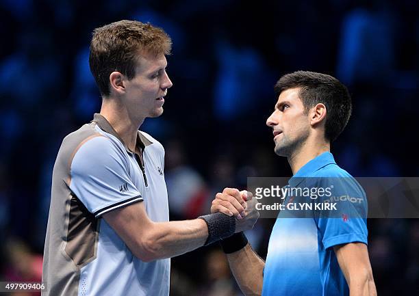 Czech Republic's Tomas Berdych congratulates Serbia's Novak Djokovic after Djokovic won 6-3, 7-5, during their men's singles group stage match on day...