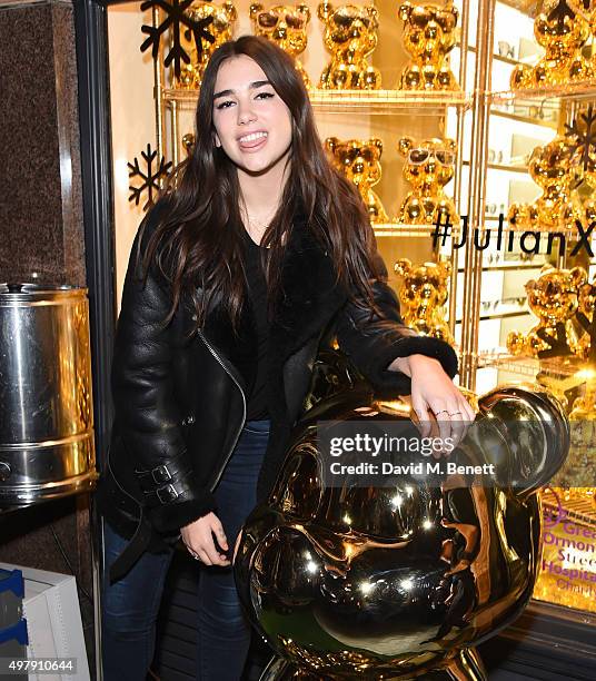 Dua Lipa attends the Mount Street Christmas Lights switch on hosted by Linda Farrow featuring the launch of Julian The Bear, the Linda Farrow Holiday...