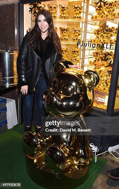 Dua Lipa attends the Mount Street Christmas Lights switch on hosted by Linda Farrow featuring the launch of Julian The Bear, the Linda Farrow Holiday...