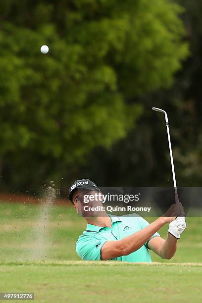 Oliver Goss of Australia plays out of the bunker during day two of the 2015 Australian Masters at Huntingdale Golf Club on November 20, 2015 in...