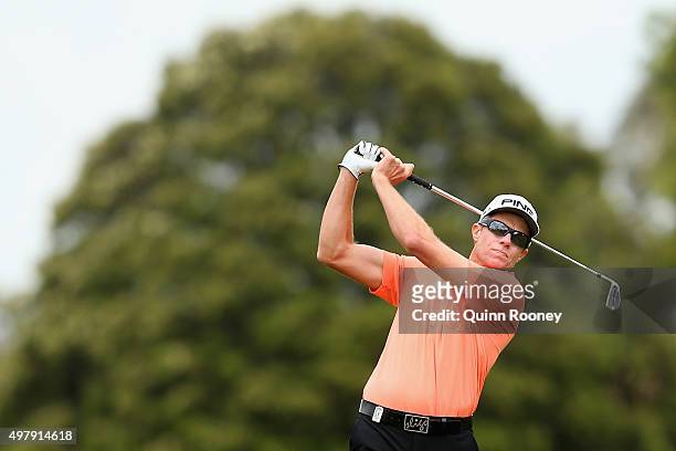 Nick O'Hern of Australia plays an approach shot during day two of the 2015 Australian Masters at Huntingdale Golf Club on November 20, 2015 in...