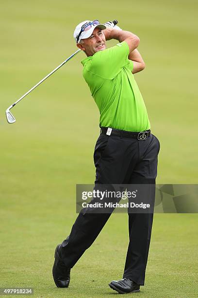 David McKenzie of Australia hits an approach shot during day two of the 2015 Australian Masters at Huntingdale Golf Club on November 20, 2015 in...