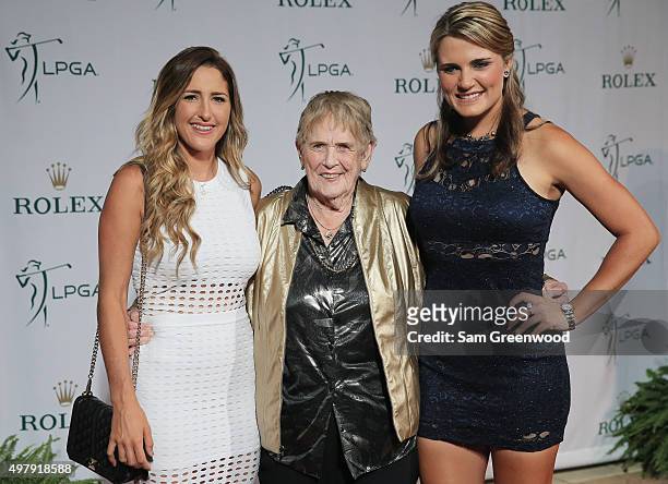 Players Jaye Marie Green and Lexi Thompson pose on the red carpet with one of the LPGA founders, Shirley Spork as they arrive to the LPGA Rolex...