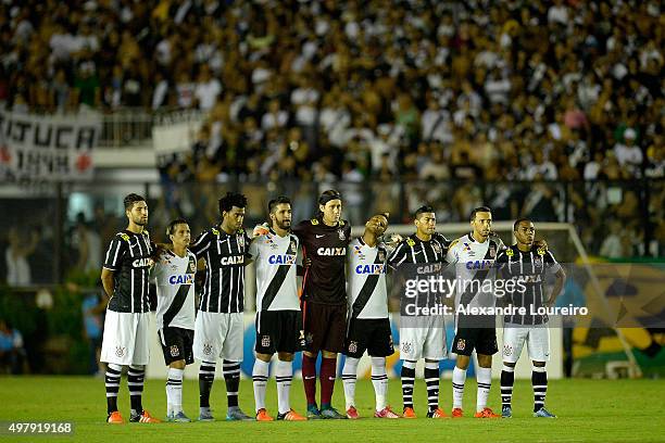 Players of Vasco and Corinthians gather together for one minute of silence to honor the victims of the terrorist attacks in Paris before the match...