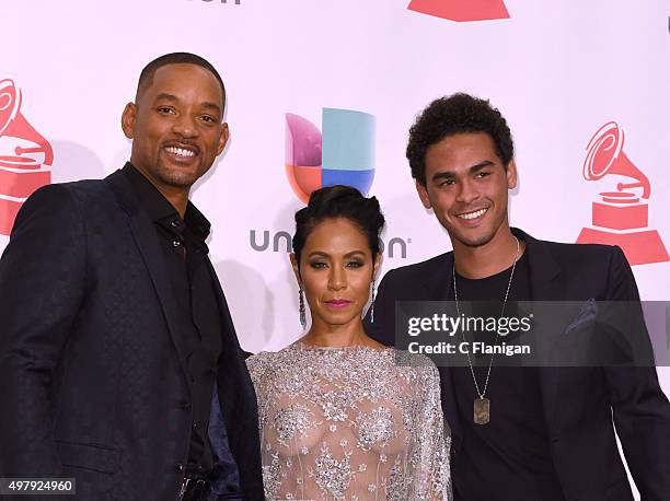 Recording artist/actor Will Smith, Jada Pinkett Smith and Willard Christopher Smith III pose backstage during the 16th Latin GRAMMY Awards on...