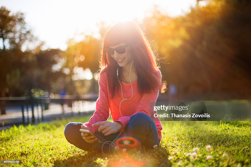 Woman listening music outdoor