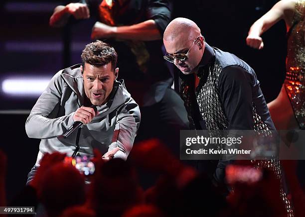 Recording artists Ricky Martin and Wisin perform onstage during the 16th Latin GRAMMY Awards at the MGM Grand Garden Arena on November 19, 2015 in...