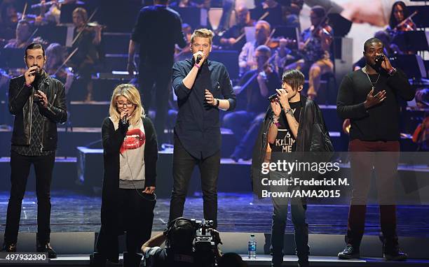 Singers Avi Kaplan, Kirstin Maldonado, Scott Hoying, Mitch Grassi and Kevin Olusola of musical group Pentatonix perform onstage during day 1 of the...