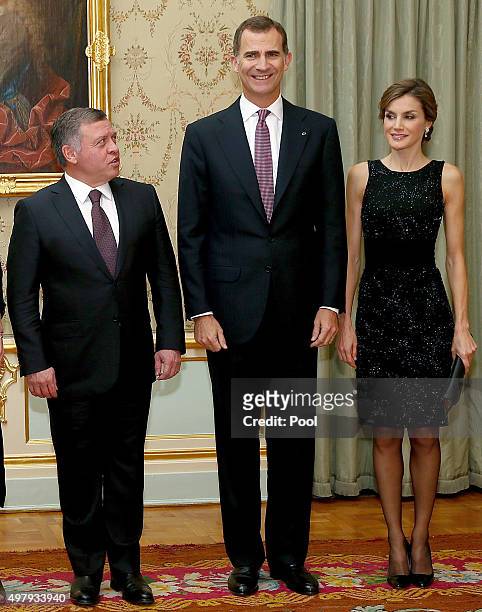King Felipe VI and Queen Letizia pose with King Abdullah II of Jordan and Queen Rania just before the private dinner in the Palace of El Pardo for...