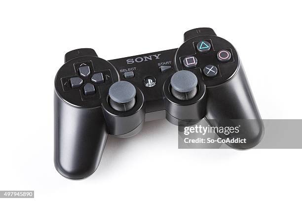 sony playstation 3 dualshock wireless video game controller - gamepad stock pictures, royalty-free photos & images