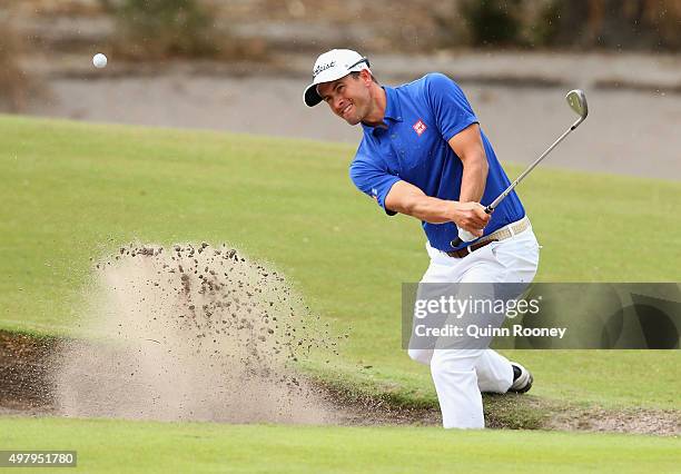 Adam Scott of Australia plays out of the bunker during day two of the 2015 Australian Masters at Huntingdale Golf Club on November 20, 2015 in...