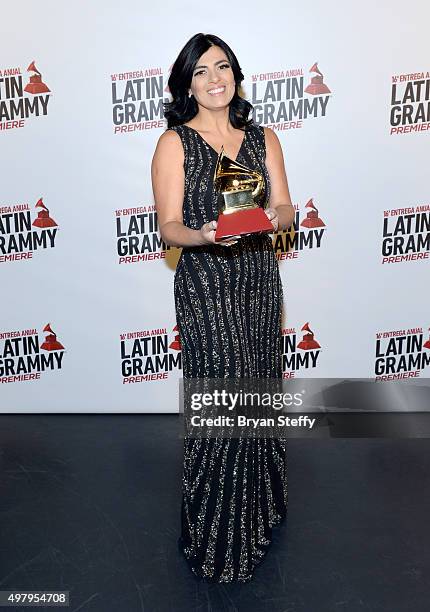 Recording artist Fernanda Brum, winner of the Best Christian Album award for "Da Eternidade," poses in the press room at the 16th Latin GRAMMY Awards...