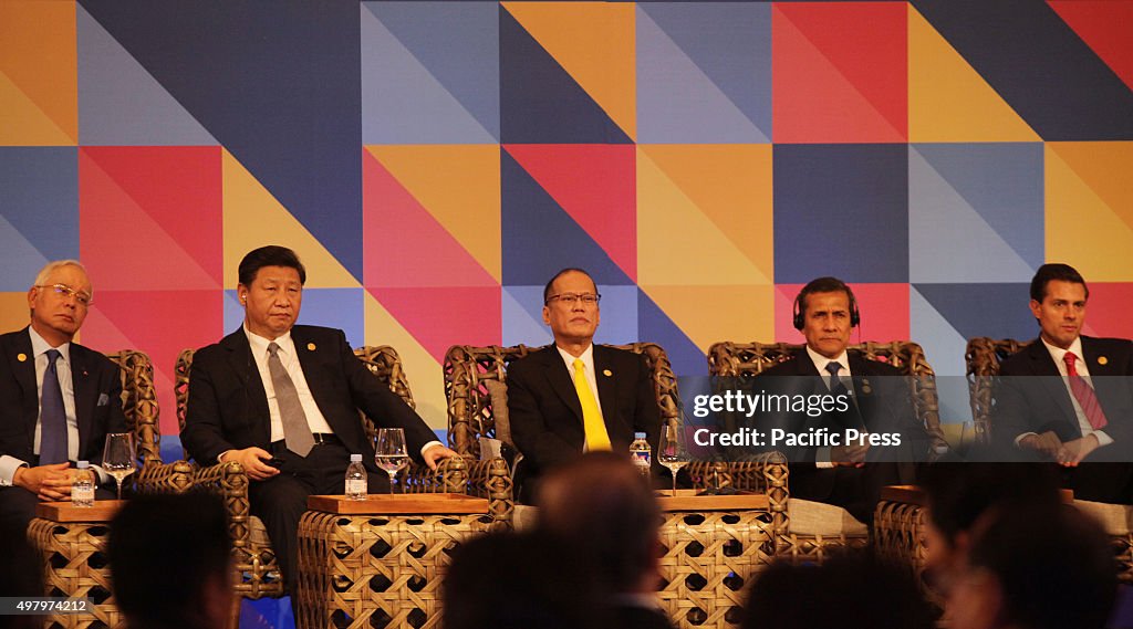 Benigno Aquino III (center), President of the Philippines...