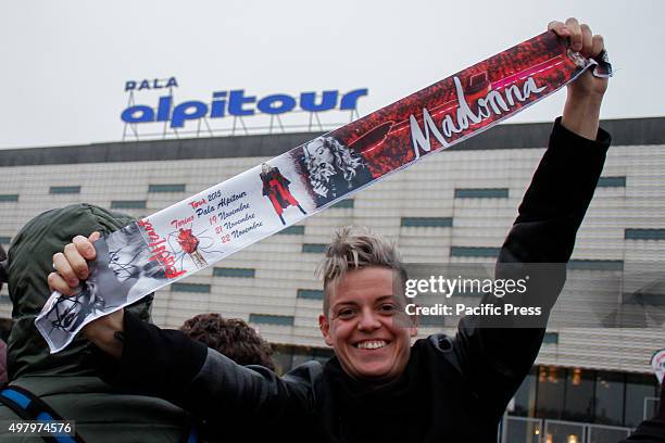 Madonna fan in front of Pala Alpitour waiting to get to the concert.