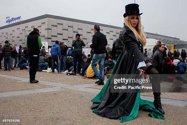 Madonna lookalike poses for the photographer outside the arena where the singer Madonna will perform for three day with her Rebel Heart Tour.