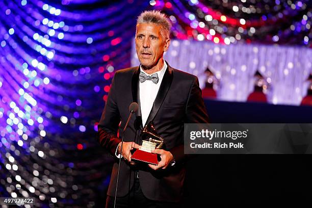 Producer Cachorro Lopez accepts the award for Best Rock Song onstage during the 16th Latin GRAMMY Awards premiere ceremony at the MGM Grand Hotel &...