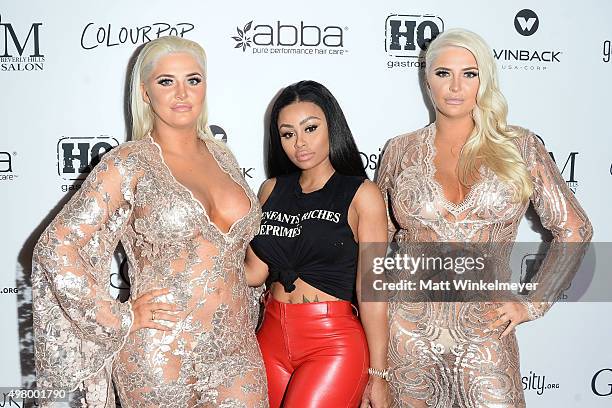 Models Karissa Shannon, Blac Chyna, and Kristina Shannon arrive at the GLAM Beverly Hills salon grand opening and ribbon cutting celebration at GLAM...