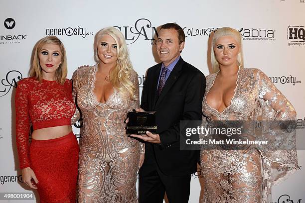 Manager Lecie Meyers,model Kristina Shannon, Chamber of Commerce chairman Kelly O. Scott, and model Karissa Shannon attend the GLAM Beverly Hills...