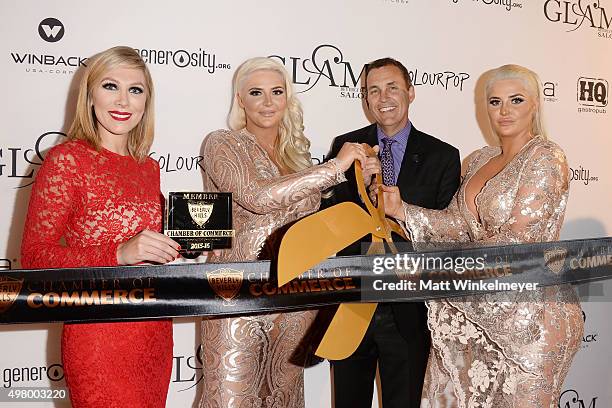 Manager Lecie Meyers,model Kristina Shannon, Chamber of Commerce chairman Kelly O. Scott, and model Karissa Shannon attend the GLAM Beverly Hills...