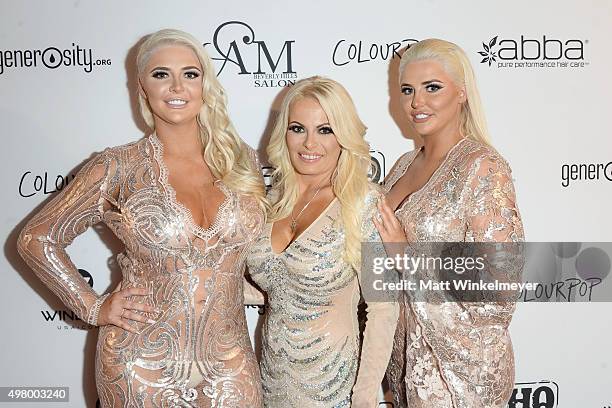 Models Kristina Shannon and Karissa Shannon arrive at the GLAM Beverly Hills salon grand opening and ribbon cutting celebration at GLAM Salon Beverly...