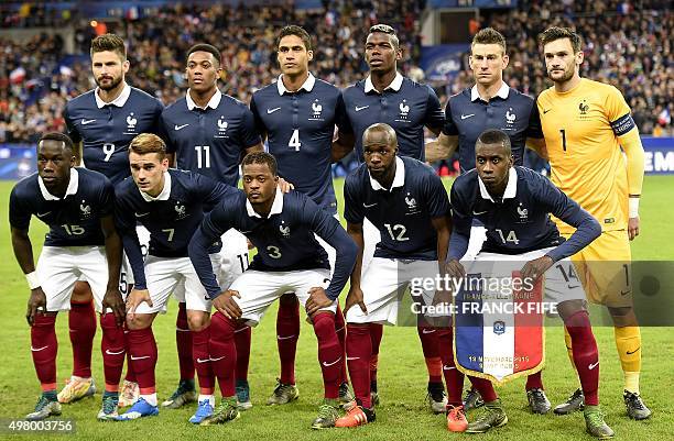 France's forward Olivier Giroud, forward Anthony Martial, defender Raphael Varane, midfielder Paul Pogba, defender Laurent Koscielny and goalkeeper...