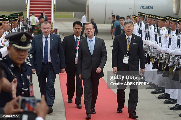 Russia's Prime Minister Dmitry Medvedev arrives to attend the 27th Association of Southeast Asian Nations Summit, at the Bunga Raya Complex at the...