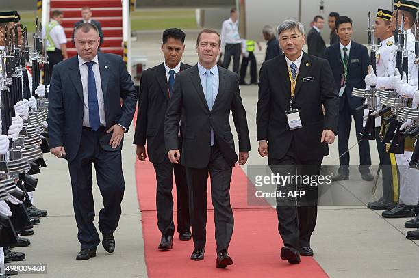 Russia's Prime Minister Dmitry Medvedev arrives to attend the 27th Association of Southeast Asian Nations Summit, at the Bunga Raya Complex at the...