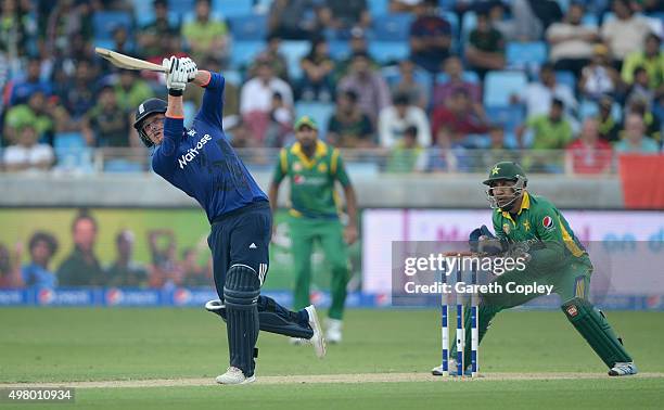 Jason Roy of England hits out for six runs during the 4th One Day International between Pakistan and England at Dubai Cricket Stadium on November 20,...