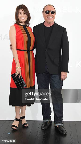 Actress Ryoko Yonekura and designer Michael Kors attend the opening event for the Michael Kors Ginza Flagship Store on November 20, 2015 in Tokyo,...