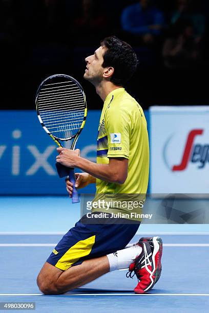 Marcelo Melo of Brazil celebrates matchpoint during the men's doubles match against Marcin Matlowski of Poland and Nenad Zimonjic of Serbia on day...