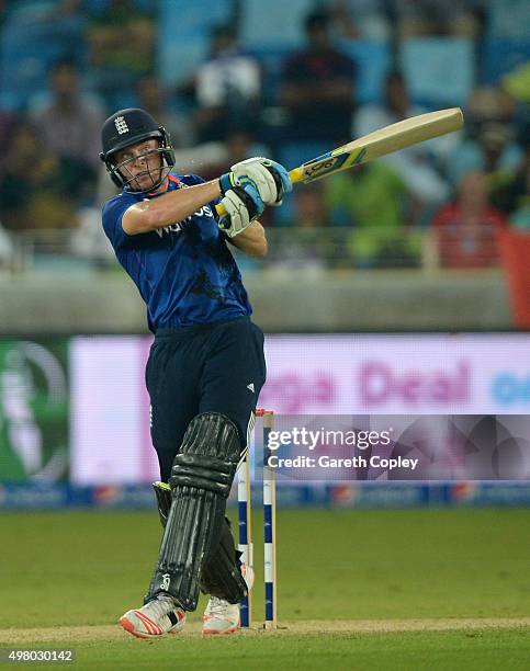 Jos Buttler of England hits out for six runs during the 4th One Day International between Pakistan and England at Dubai Cricket Stadium on November...