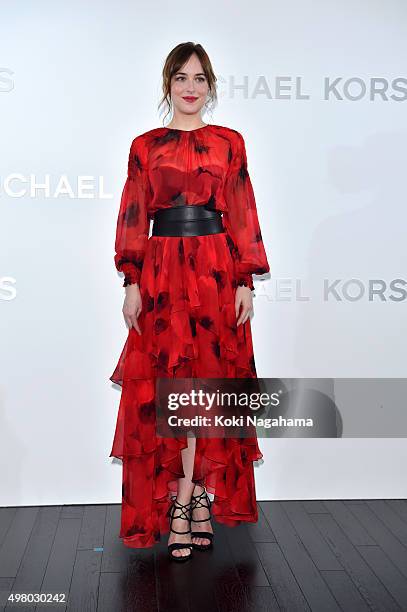 Dakota Johnson attends the opening event for the Michael Kors Ginza Flagship Store on November 20, 2015 in Tokyo, Japan.