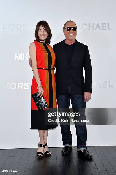 Designer Michael Kors and actress Ryoko Yonekura attend the opening event for the Michael Kors Ginza Flagship Store on November 20, 2015 in Tokyo,...