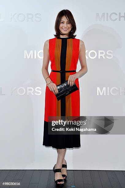 Actress Ryoko Yonekura attends the opening event for the Michael Kors Ginza Flagship Store on November 20, 2015 in Tokyo, Japan.