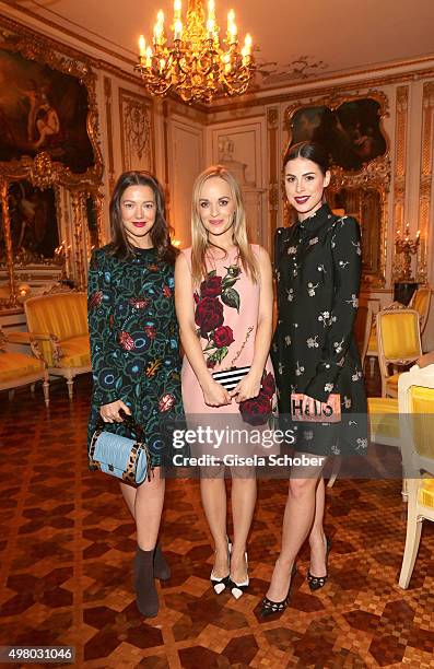 Hannah Herzsprung, Friederike Kempter and Lena Meyer-Landrut pose during the mytheresa.com X Gianvito Rossi dinner at St. Emmeram Castle on November...