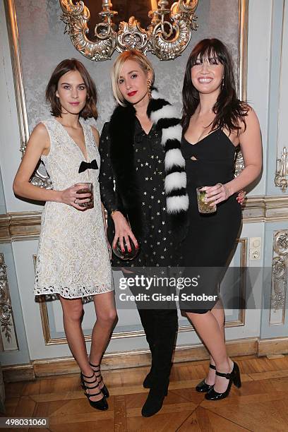 Alexa Chung, Princess Elisabeth von Thurn und Taxis and Daisy Lowe pose during the mytheresa.com X Gianvito Rossi dinner at St. Emmeram Castle on...