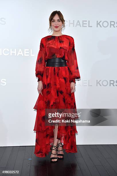Dakota Johnson attends the opening event for the Michael Kors Ginza Flagship Store on November 20, 2015 in Tokyo, Japan.