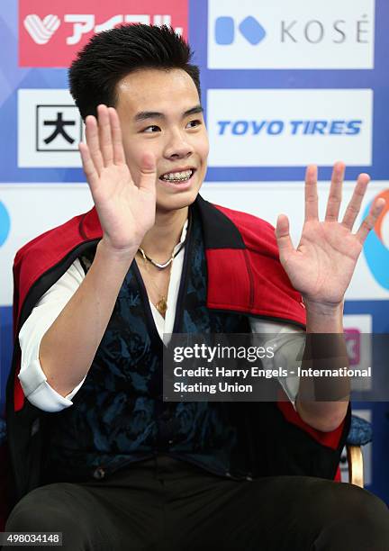 Nam Nguyen of Canada waves to the crowd after skating during the Men's Short Program on day one of the Rostelecom Cup ISU Grand Prix of Figure...