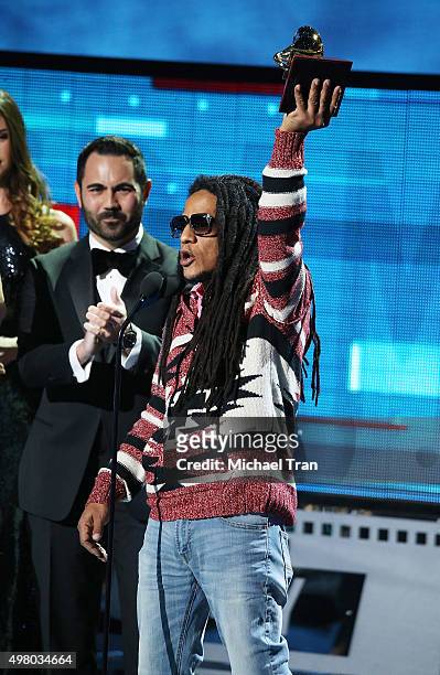 Tego Calderon accepts the Best Urban Music Album Grammy onstage during the 16th Annual Latin GRAMMY Awards held at MGM Grand Garden Arena on November...
