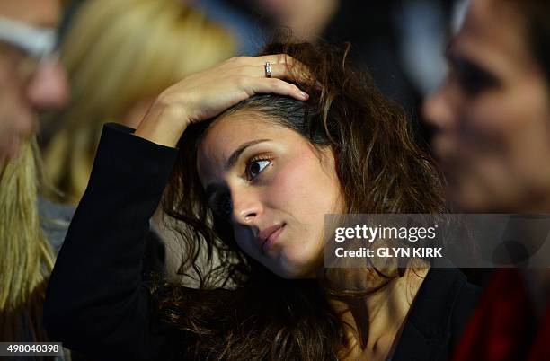 Maria Francisca Perello, the girlfriend of Spain's Rafael Nadal watches him beat Spain's David Ferrer during a men's singles group stage match on day...