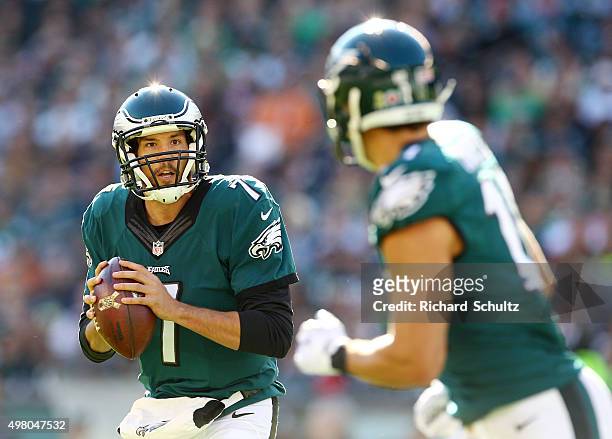 Quarterback Sam Bradford of the Philadelphia Eagles looks to pass to Riley Cooper against the Miami Dolphins during a football game at Lincoln...