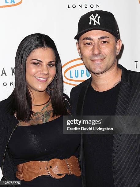 Musical artist Dennis DeSantis and wife attend the 13th Annual Lupus LA Hollywood Bag Ladies Luncheon at The Beverly Hilton Hotel on November 20,...