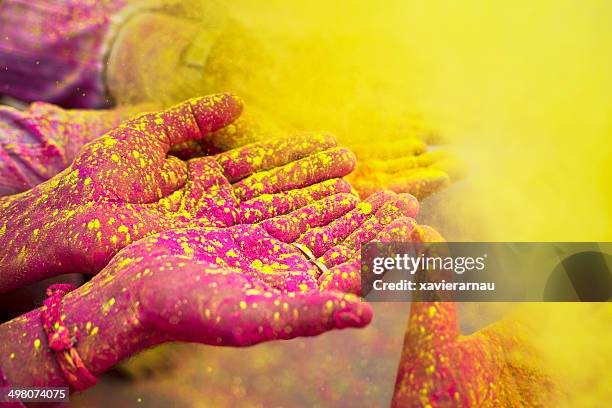 holy hands - holi hands stock pictures, royalty-free photos & images