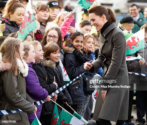 Catherine, Duchess of Cambridge undertakes a walkabout in Castle Square, Caernarfon during a day of engagements in North Wales on November 20, 2015...