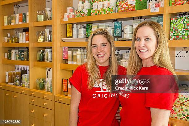 Origins team members pose during the Origins new discovery store concept celebration on November 20, 2015 in Austin, Texas.